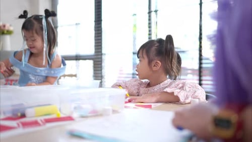Children Doing Arts and Crafts at a Table