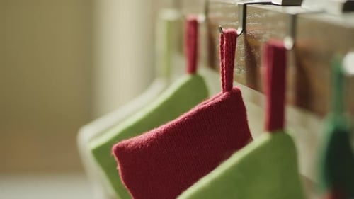 Christmas Stockings Hanging on Hooks in Home