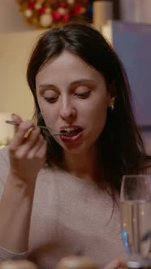Vertical Video Close Up of Woman Eating Food and Clinking Glass of Champagne