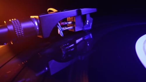 Vinyl Disk on DJ Turntable Record Player Rotating Plate and Needle Stylus Loop Macro View