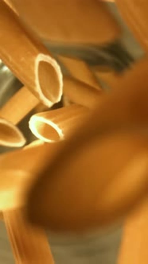 Super Slow Motion Dry Penne Pasta Filmed on a Highspeed Camera at 1000 Fps