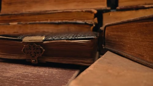 Macro View of Saved Medieval Books with Ancient Writings Religious Literature Archival Manuscripts
