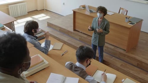 Professor Lecturing Students in University Lecture Hall