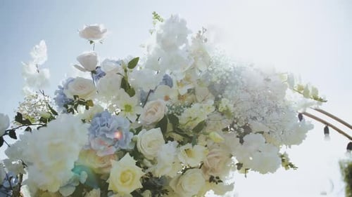 Beautiful Floral Arrangement With Roses Under Bright Sky