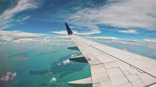 Beautiful clouds and airplane wings
