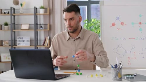 Distance Education, School and Remote Job Concept - Male Chemistry Teacher With