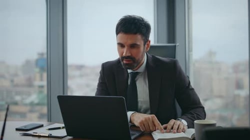 Manager Talking Online Interview Looking Laptop Camera in Luxury Office Close Up