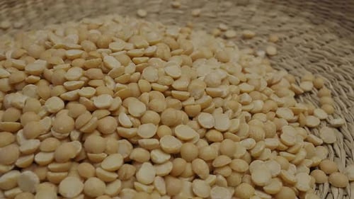 Close Up Pile of Dried Split Peas in Bowl