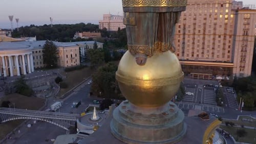 Independence Monument on the Background of City Architecture Maidan Nezalezhnosti