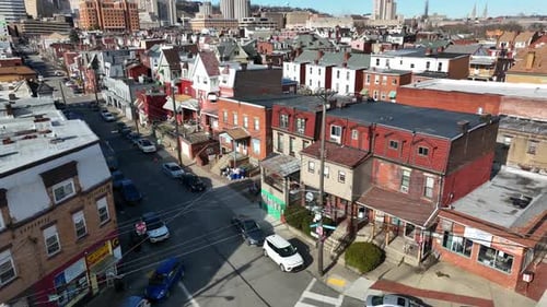 Housing for University of Pittsburgh students. Aerial tilt up reveal of houses and Cathedral of Lear