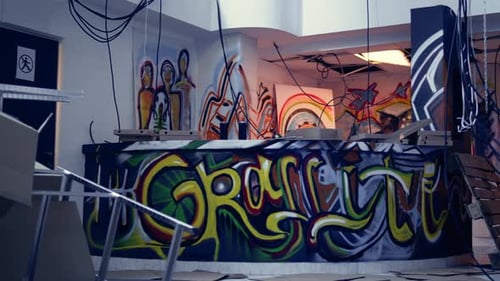 Empty Derelict Building with Creative Graffiti Street Art on Walls