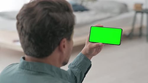 Man Holding Green Chroma Key Smartphone