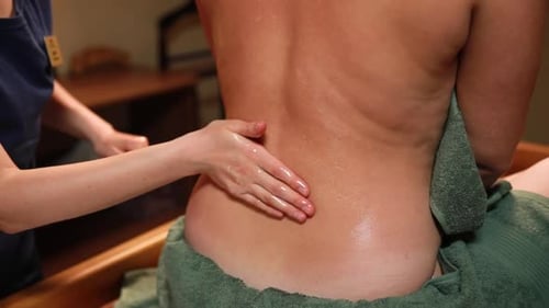 Ayurvedic massage for beautiful woman in spa