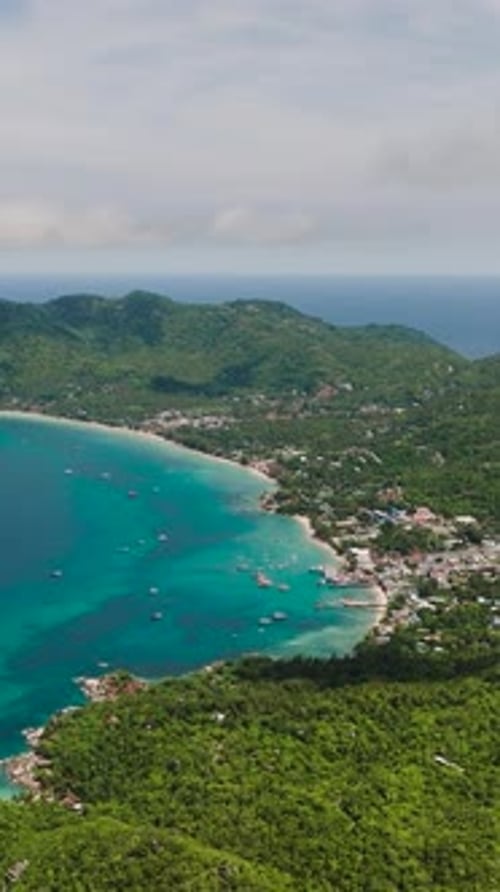 Coastal Landscape with Green Hills and Vibrant Sea Koh Tao Thailand