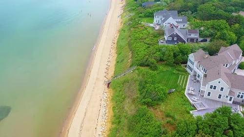 Cape Cod Aerial of Beach Houses Beneath Dark Cloudy Skies