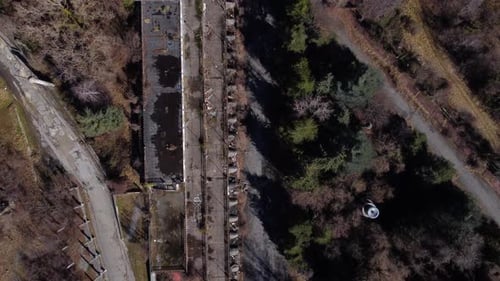 Abandoned and ruined landscape in Consonno, Italy. Cenital aerial shot.