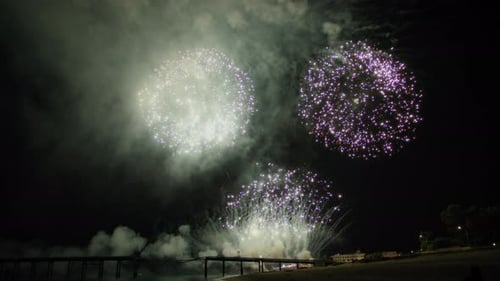 Fireworks Over the City to Celebrate the New Year at Night
