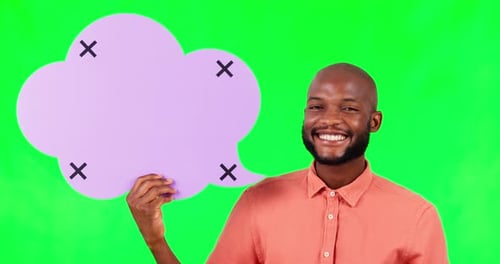 Speech bubble, mockup and a black man on green screen in studio for social media communication