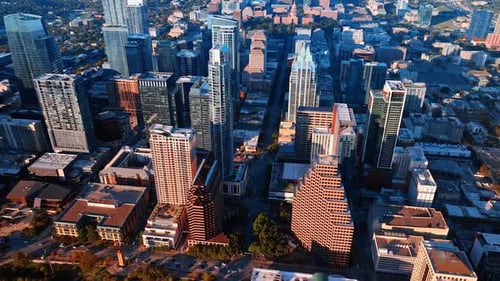 Bright sun lights the high-rise buildings in the scenery of Austin, Texas.