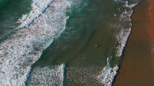 Aerial Top View Ocean Turquoise Waves Breaking on Beach