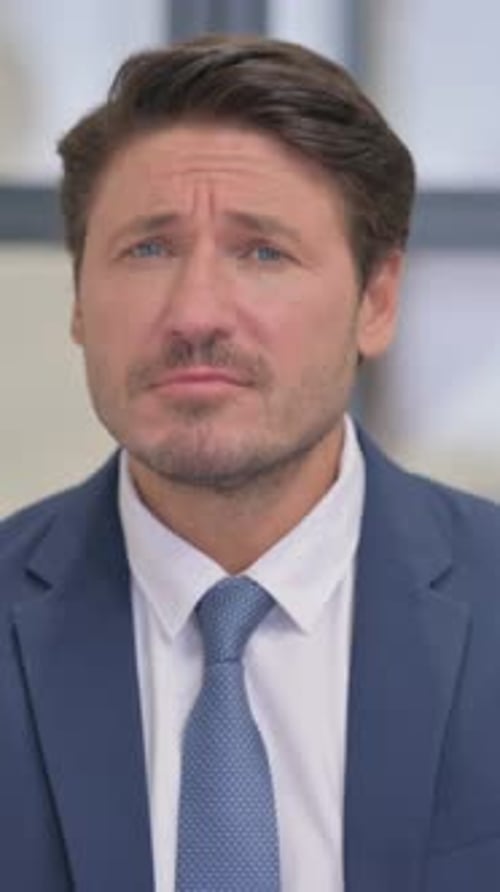 Businessman in Suit Talking, Vertical Video Portrait