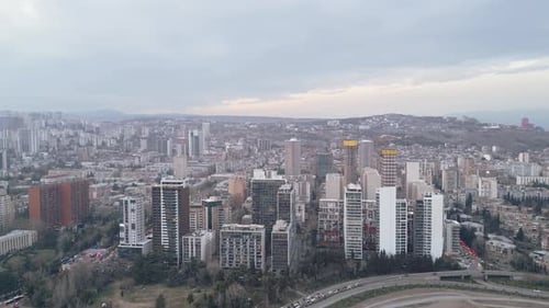 Expansive Cityscape Aerial View Under Overcast Sky