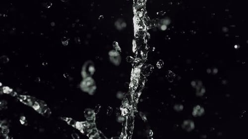 Sudden Water Splash And Droplets Falling In Slow Motion