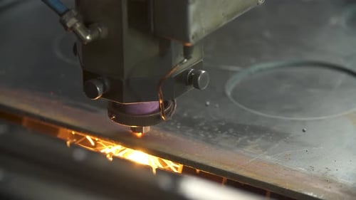 Laser Cutting Metal Sheet with Bright Sparkles