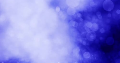 Abstract Blue Particles Floating in Space