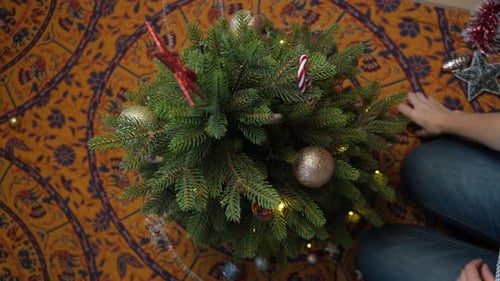 Decorating Small Christmas Tree at Home, Overhead View