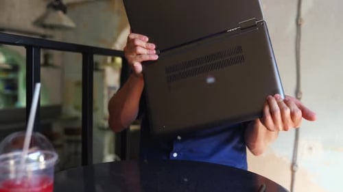 Freelancer Man Transforms Convertible Laptop to Tablet Mode and Works with Touchscreen Digital