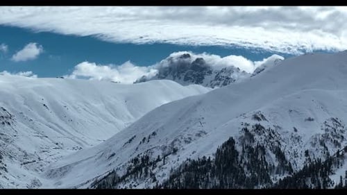Majestic Snow Mountains on Sunny Day