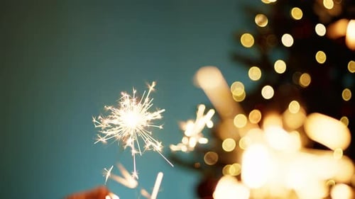 Sparkling Sparklers at Christmas with Twinkling Tree
