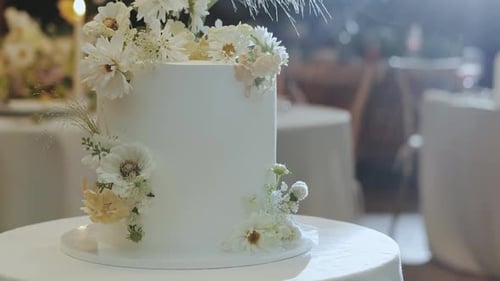 Elegant Wedding Cake with White Floral Decorations