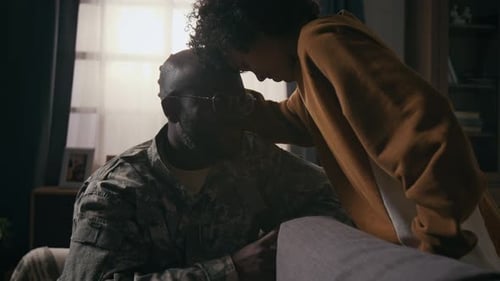 Loving Family Moment With a Soldier at Home