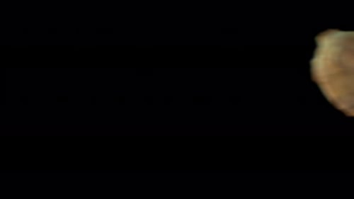 Computergrafik von fliegenden und rotierenden Meteoritensteinen auf schwarzem Hintergrund