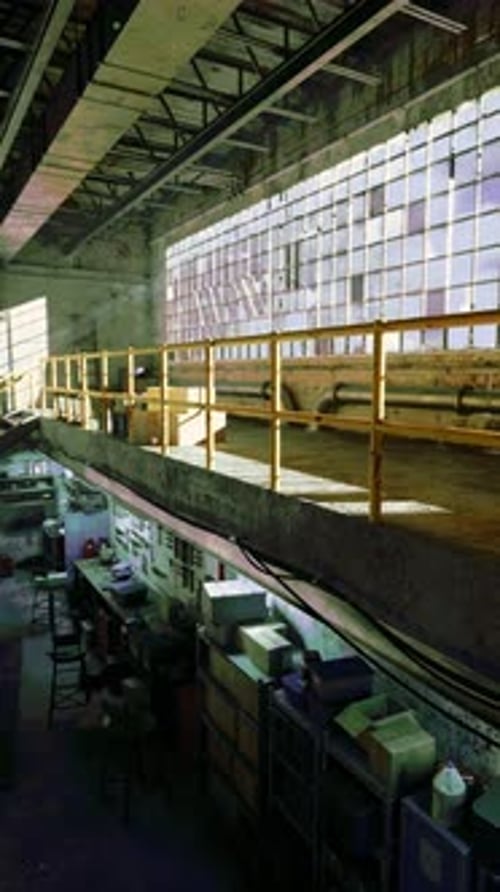 Dynamic Sunlight Movement in Industrial Interior Time Lapse