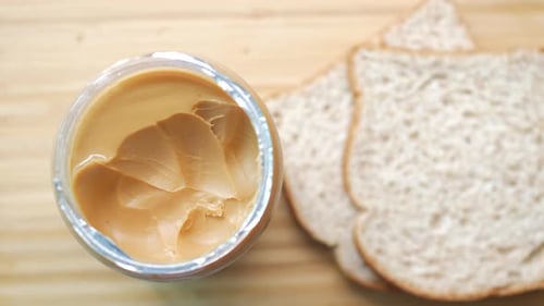 Top View of Peanut Butter in a Container