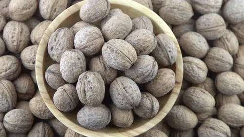 Walnut in Shell Background View From Above Healthy Food Bowl Top View