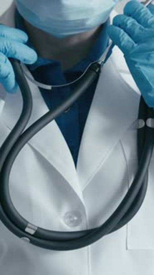 Healthcare Professional Adjusting Stethoscope Close Up