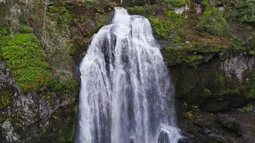 Beautiful Relaxing waterfall 4k drone footage in the Pacific Northwest America forest.