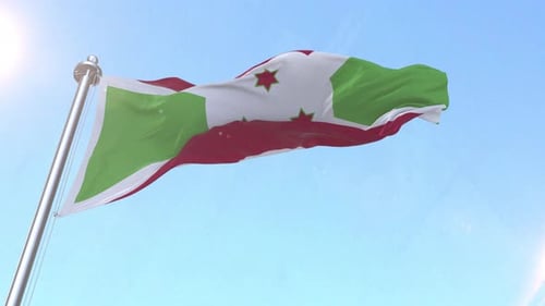 Realistic Waving Flag of Burundi Against Blue Sky