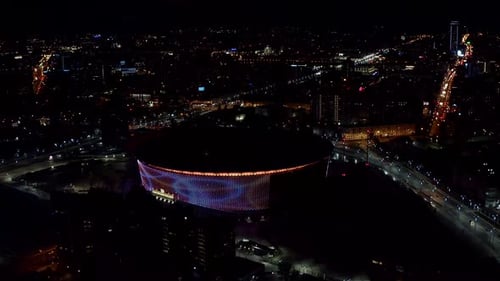 Night landscape of modern city with flashing lights