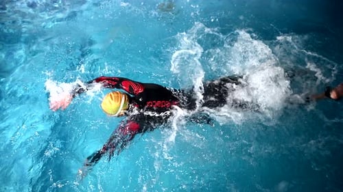 Underwater View of Professional Swimmer Training in Swimming Pool 120 Fps Super Slow Motion Raw