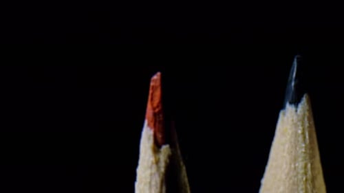 Close Up of Sharpened Colored Pencils on Black