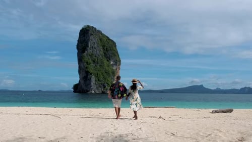 Koh Poda Krabi Thailand Asian Woman and European Men Walking on the Tropical Beach of Koh Poda