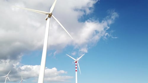 Timelapse of Wind Turbine Under Blue Sky