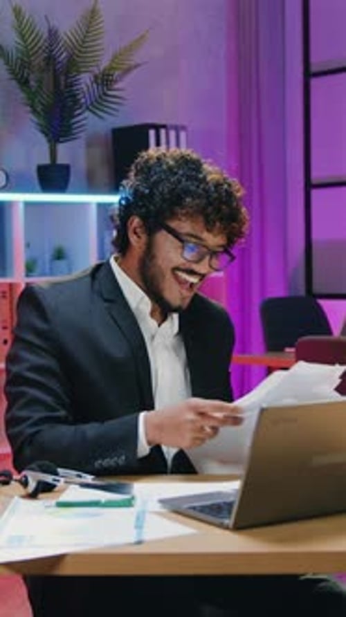 Business Triumph Concept Where Businessman in Glasses Throwing Up a Lot of Documents and Enjoying