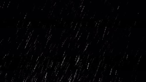 Fast Snow Flies Down on a Black Background