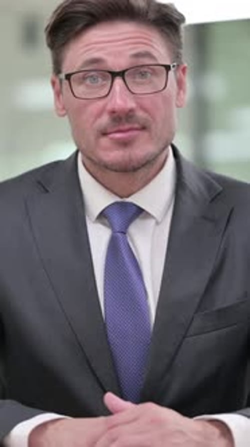 Close Up Portrait of Smiling Businessman